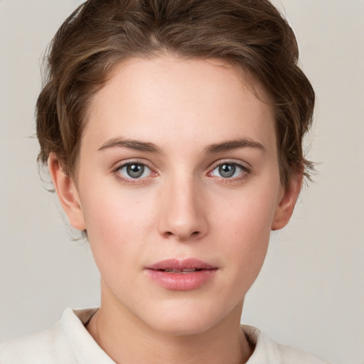 Neutral white young-adult female with short  brown hair and grey eyes