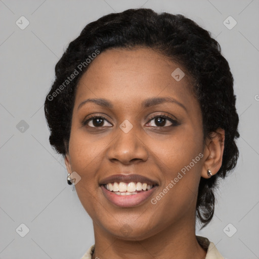 Joyful black young-adult female with medium  black hair and brown eyes