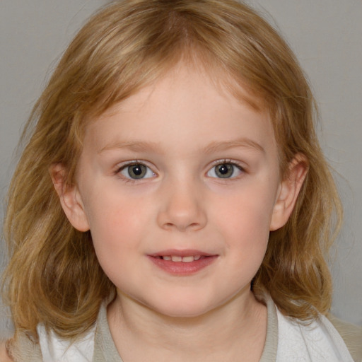 Joyful white child female with medium  brown hair and blue eyes