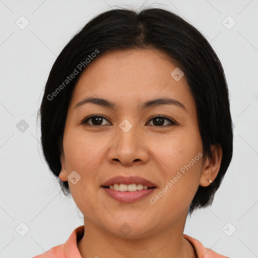 Joyful asian young-adult female with medium  brown hair and brown eyes