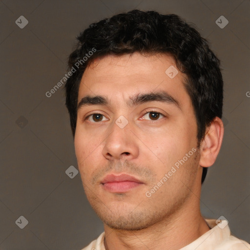 Neutral white young-adult male with short  black hair and brown eyes