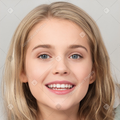 Joyful white young-adult female with long  brown hair and blue eyes