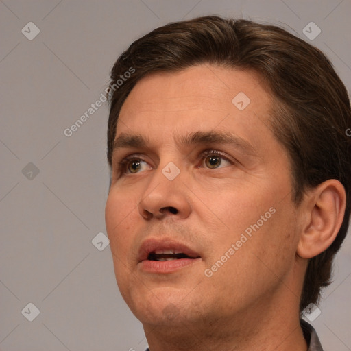 Neutral white adult male with short  brown hair and brown eyes