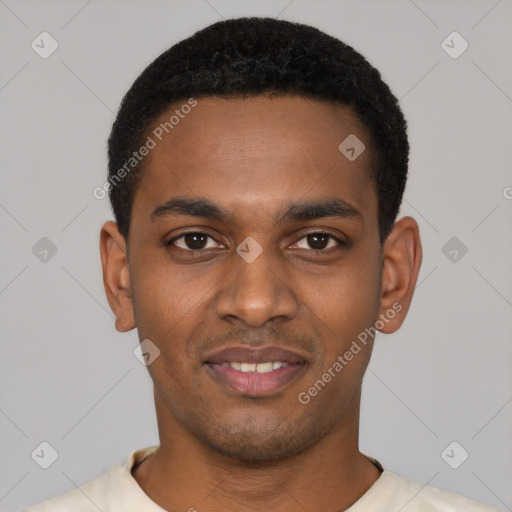 Joyful black young-adult male with short  black hair and brown eyes