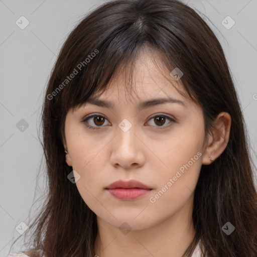 Neutral white young-adult female with long  brown hair and brown eyes