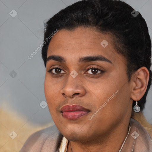 Joyful latino young-adult female with short  black hair and brown eyes