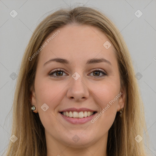 Joyful white young-adult female with long  brown hair and brown eyes