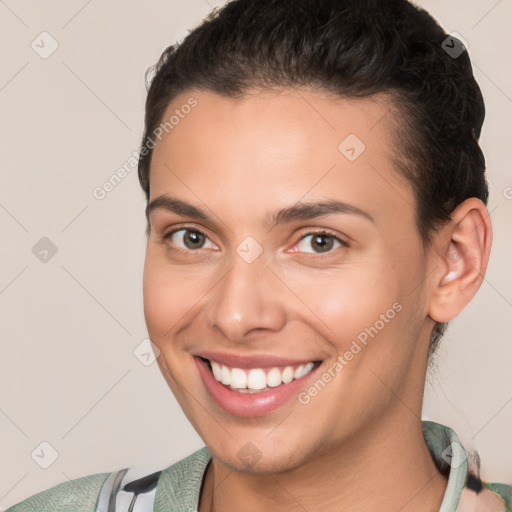 Joyful white young-adult female with short  brown hair and brown eyes