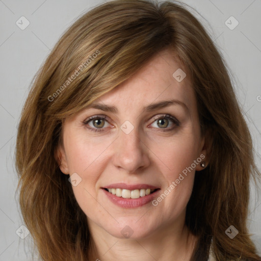 Joyful white young-adult female with medium  brown hair and green eyes