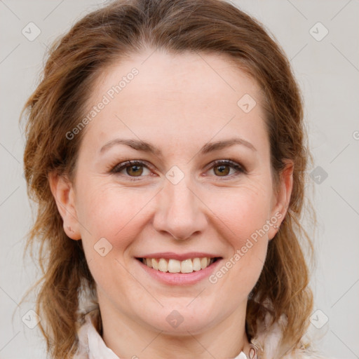 Joyful white young-adult female with medium  brown hair and green eyes