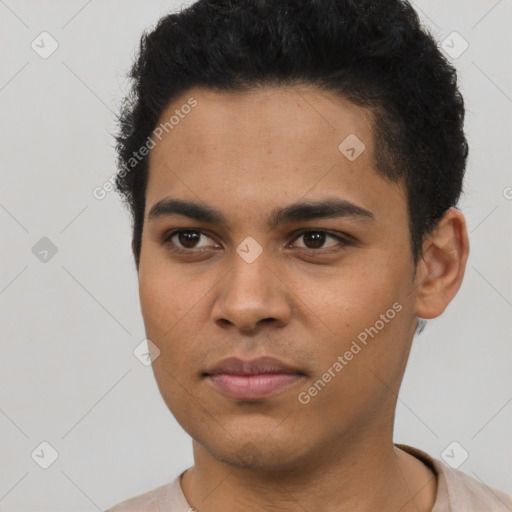 Neutral latino young-adult male with short  black hair and brown eyes