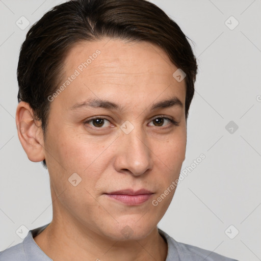 Joyful white young-adult female with short  brown hair and brown eyes