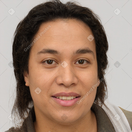 Joyful white adult female with medium  brown hair and brown eyes