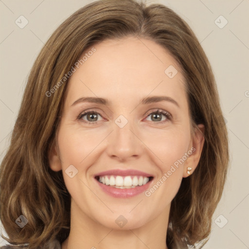 Joyful white young-adult female with medium  brown hair and green eyes