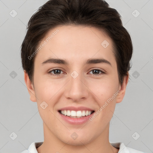 Joyful white young-adult female with short  brown hair and brown eyes