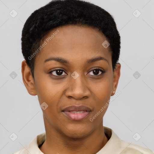 Joyful black young-adult female with short  black hair and brown eyes