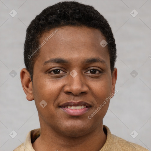 Joyful black young-adult male with short  brown hair and brown eyes