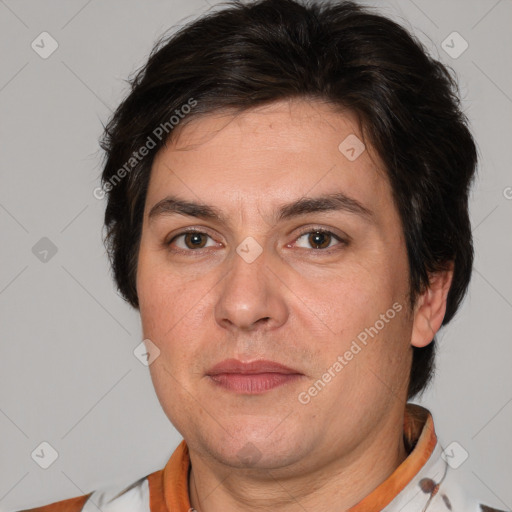 Joyful white adult male with medium  brown hair and brown eyes