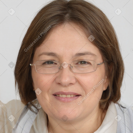 Joyful white adult female with medium  brown hair and brown eyes