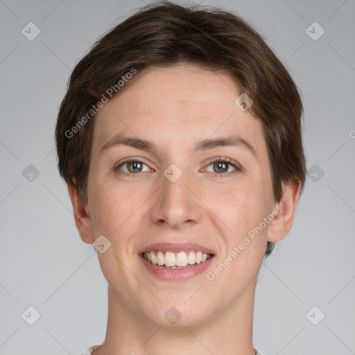 Joyful white young-adult female with short  brown hair and grey eyes