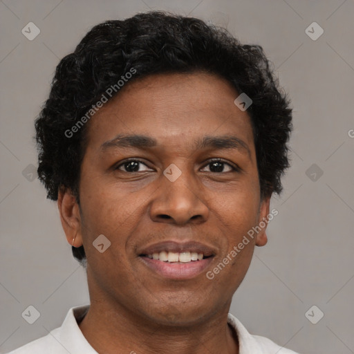 Joyful latino adult male with short  brown hair and brown eyes