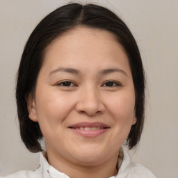 Joyful white adult female with medium  brown hair and brown eyes