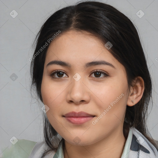 Joyful latino young-adult female with medium  brown hair and brown eyes