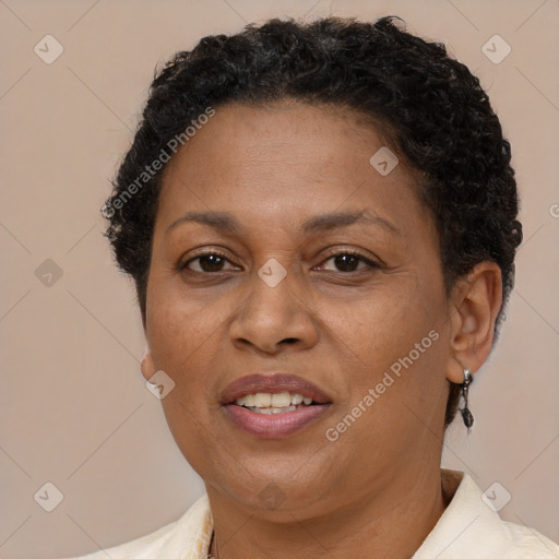 Joyful black adult female with short  brown hair and brown eyes