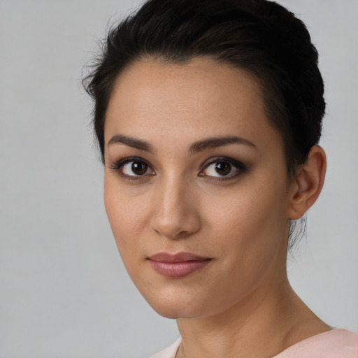 Neutral latino young-adult female with short  black hair and brown eyes