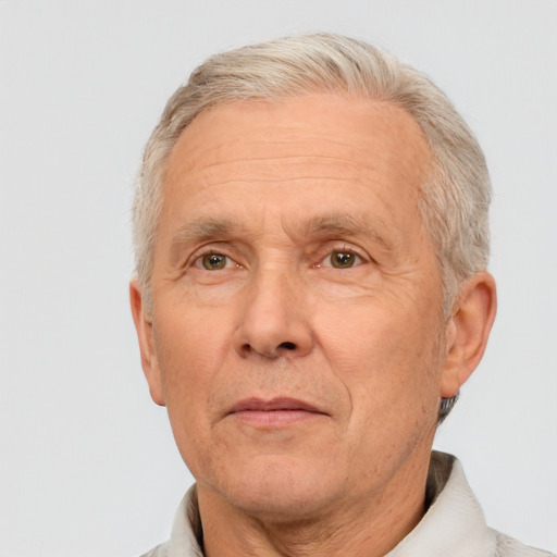 Neutral white middle-aged male with short  gray hair and brown eyes