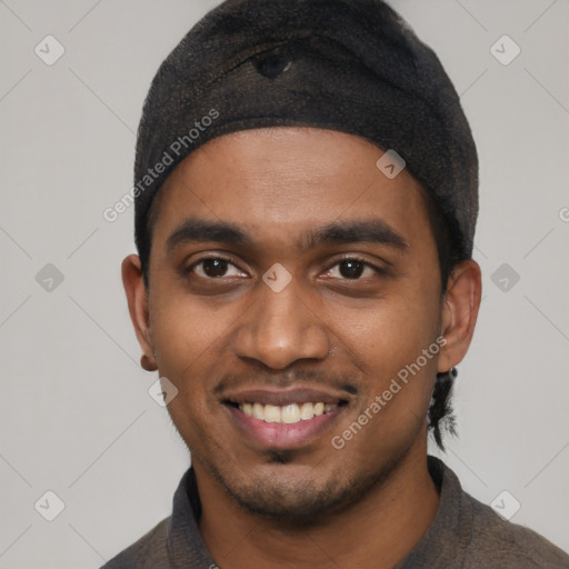 Joyful black young-adult male with short  black hair and brown eyes