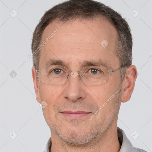 Joyful white middle-aged male with short  brown hair and brown eyes