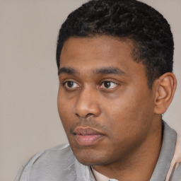 Neutral black young-adult male with short  black hair and brown eyes