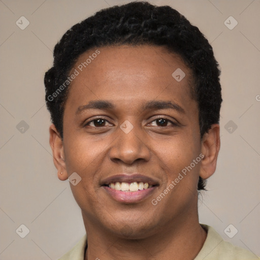 Joyful black young-adult male with short  black hair and brown eyes