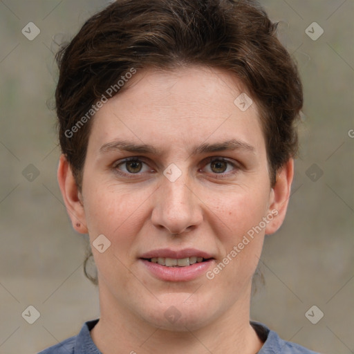 Joyful white adult female with short  brown hair and grey eyes