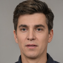 Neutral white adult male with short  brown hair and brown eyes