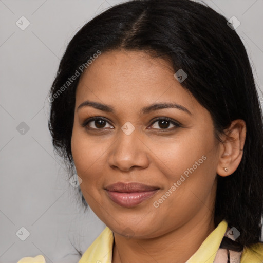 Joyful latino young-adult female with medium  brown hair and brown eyes