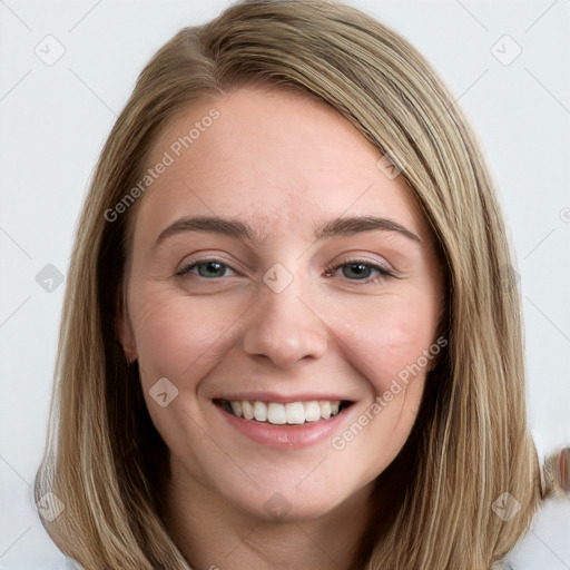 Joyful white young-adult female with long  brown hair and blue eyes