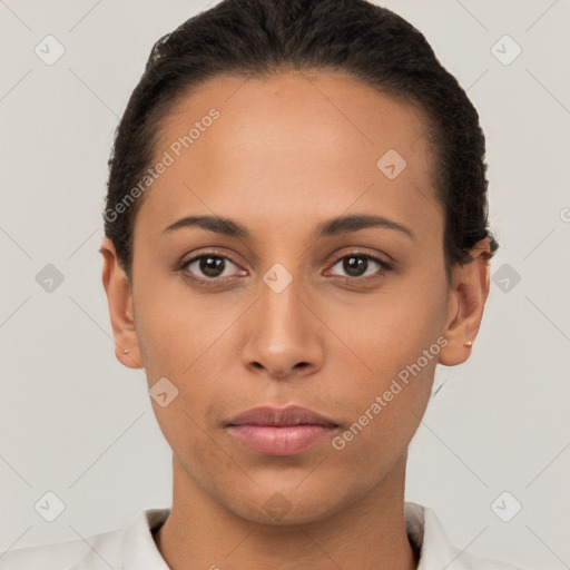 Neutral latino young-adult female with short  brown hair and brown eyes