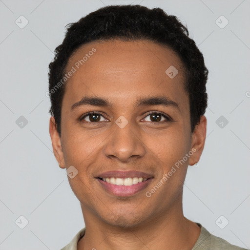 Joyful black young-adult male with short  black hair and brown eyes