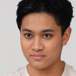 Joyful latino young-adult female with short  black hair and brown eyes