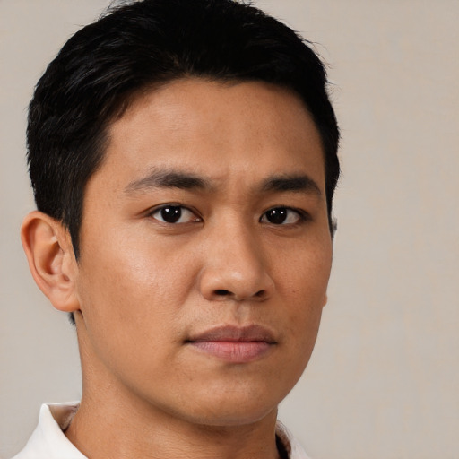 Neutral asian young-adult male with short  brown hair and brown eyes