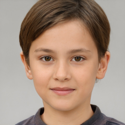Joyful white child female with short  brown hair and brown eyes