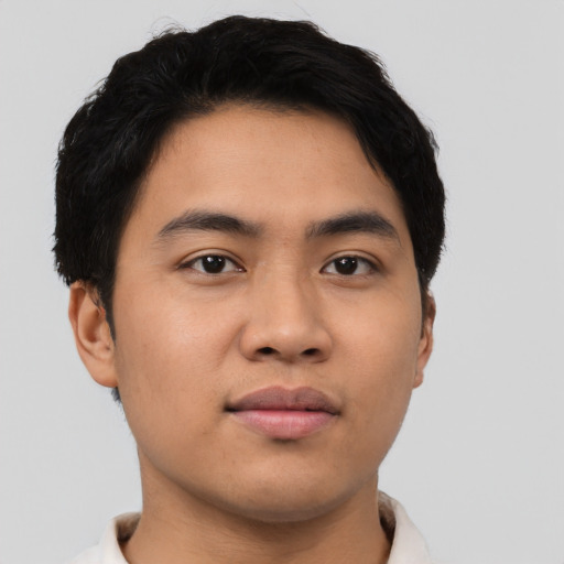 Neutral asian young-adult male with short  black hair and brown eyes