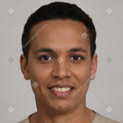 Joyful latino young-adult male with short  black hair and brown eyes