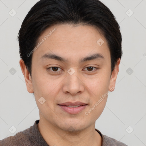 Joyful white young-adult male with short  black hair and brown eyes