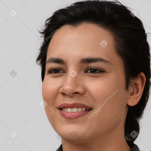 Joyful asian young-adult female with medium  brown hair and brown eyes