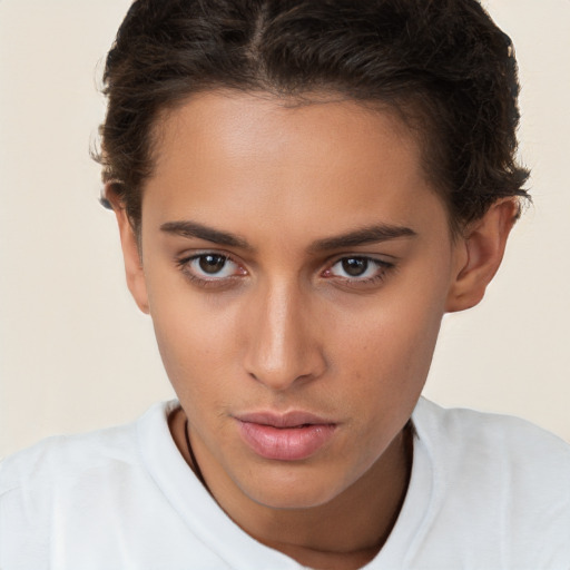 Neutral white young-adult female with short  brown hair and brown eyes