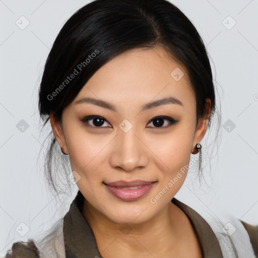 Joyful asian young-adult female with medium  black hair and brown eyes