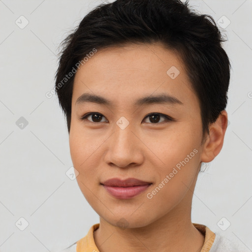 Joyful asian young-adult female with short  brown hair and brown eyes